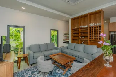 a living room with a couch and a table at Taraburi 6BR Pool Villa Phuket VVPHU91 in Thalang
