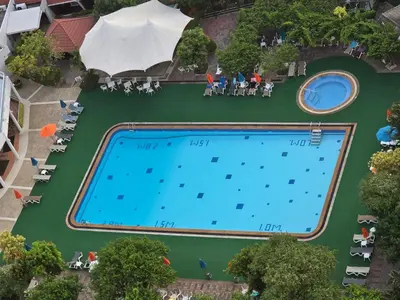 an overhead view of a swimming pool at a resort at PATONG TOWER 5's STAR in Patong Beach