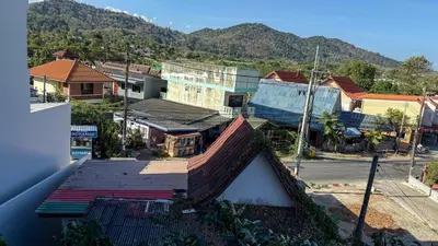 an overhead view of a town with mountains in the background at Chardonnay Naiharn 1BR spacious apart BRAND new in Rawai Beach