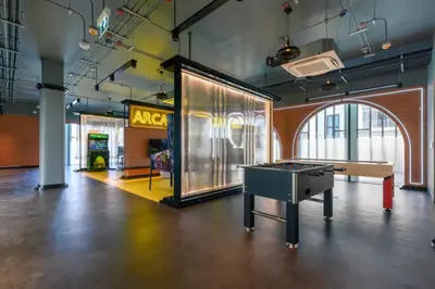 a room with a ping pong table in the middle at High-end 1BR at Title Bangtao by Sabay Rent E704 in Bang Tao Beach