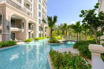 a swimming pool in the middle of a building at High-end 1BR at Title Bangtao by Sabay Rent E704 in Bang Tao Beach
