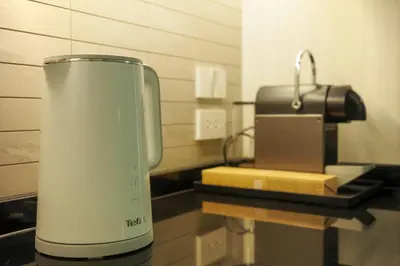 a food processor sitting on a counter in a kitchen at Bangtao Premium 2BR Apartment, Title Legendary B201 in Bang Tao Beach