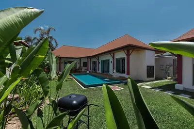 a house with a swimming pool in the yard at VILLA Kaheru Private Pool Near Nai Harn Beach in Nai Harn Beach