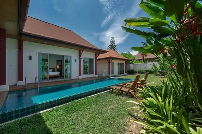 a swimming pool in the backyard of a villa at VILLA Kaheru Private Pool Near Nai Harn Beach in Nai Harn Beach