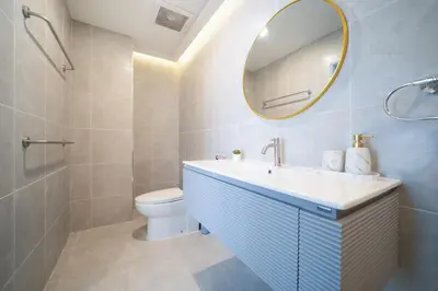 a bathroom with a sink and a toilet and a mirror at Heaven pool villa reach beach in 3 mins bangla10m in Patong Beach