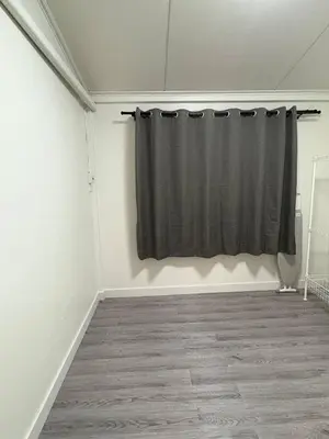 a room with a black curtain on a wall at 3BR Family Villa - 1 km to Chalong Pier with WiFi in Chalong