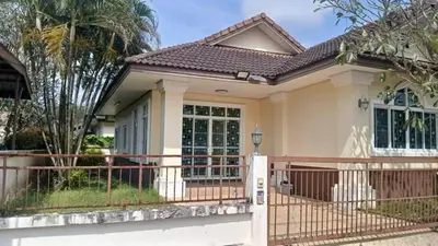 a house with a fence in front of it at Joyful House3 in Thalang