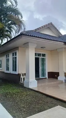 a small white house with a large patio at Joyful House3 in Thalang