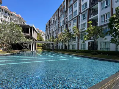 an empty street in front of a building at D Condo Mine Kathu Smart Monthly Living 30-Day Stay in Kathu