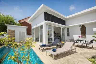an image of a villa with a swimming pool at Green 9 Private Pool Villa 2BR near Rawai Beach in Ban Saiyuan (1)