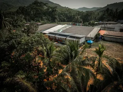 an overhead view of a building with palm trees at The Nap Koh Yao Yai in Ban Nai Wat