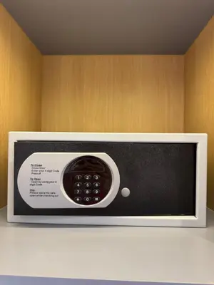 a microwave with a bowl inside of it at Wyndham apartment Naithon in Nai Thon Beach