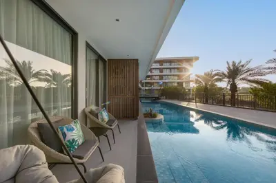 a view of a swimming pool in a hotel at Lamia 1BR Suite at Kora Beach Resort in Layan Beach