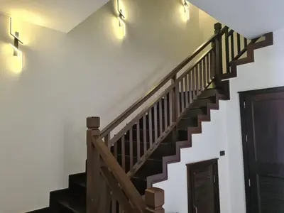 a wooden staircase with lights on the wall at Desiner Villa in Laguna Village, Bang Tao Beach, Phuket in Layan Beach