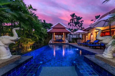 a resort swimming pool with a gazebo at Baan Bua Estate Villas by TropicLook in Nai Harn Beach