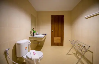 a bathroom with a toilet and a sink at Z-Talay House in Klong Muang Beach