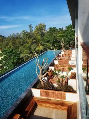 a view of the infinity pool at a resort at Norn Talay Surin Beach Phuket in Surin Beach