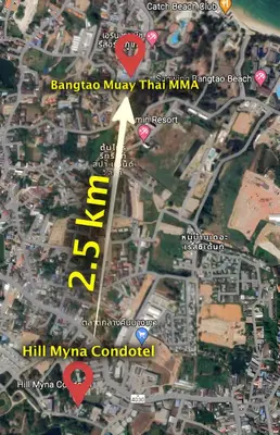 a map of a city with a yellow arrow at Hill Myna Condotel Official Account in Bang Tao Beach