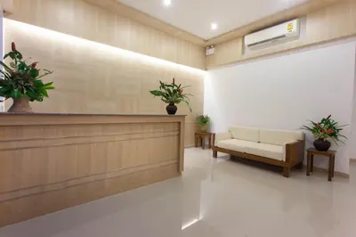 a lobby with a waiting room with a couch and plants at Chalong Princess Pool Villa Resort SHA EXTRA PLUS in Chalong