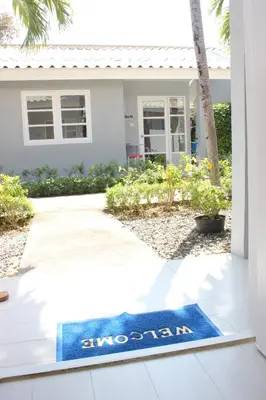 a welcome mat in front of a house at 1715 House - White Rhino in Rawai Beach