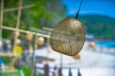 a gold net bag hanging from a string at Anyavee Krabi Beach Resort in Klong Muang Beach