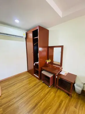 a bathroom with a desk and a mirror at Phi Phi Little Star Resort in Phi Phi Don