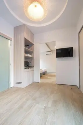 a large living room with a large ceiling at Ozone Villa Phuket in Ban Pa Khlok