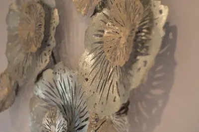 a close up of a vase on a wall at Ozone Villa Phuket in Ban Pa Khlok