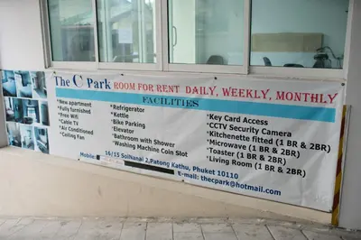 a sign on the window of a restaurant at The C Park in Patong Beach
