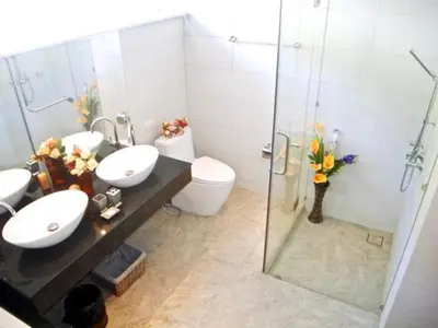 a bathroom with two sinks and a shower at Skylight 2 bedrooms Villa in Kamala in Kamala Beach