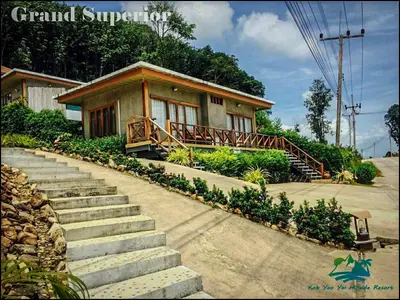 a small house with a staircase leading to it at Koh Yao Yai Hillside Resort in Ko Yao Yai