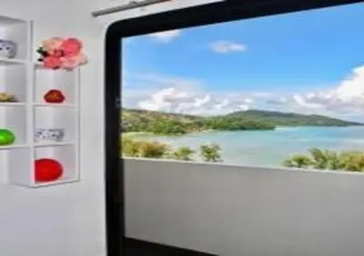 a computer screen with a view of the ocean at Patong Tower 1-Bedroom Apartment Full Sea View in Patong Beach