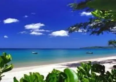 a view of a beach with boats in the water at Emerald Patong New Studio with Balcony in Patong Beach