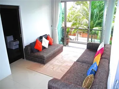 a living room with two couches and a balcony at Eva Villa Rawai 3 bedrooms Private Pool in Rawai Beach
