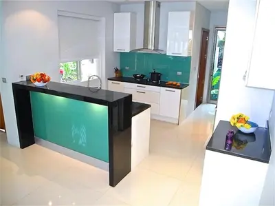 a kitchen with a black and green counter top at Eva Villa Rawai 3 bedrooms Private Pool in Rawai Beach