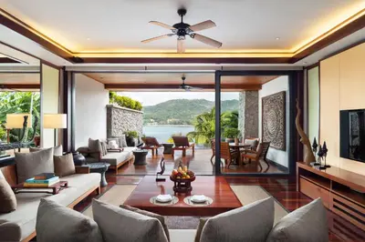 an open living room with a view of the ocean at Andara Resort Villas in Kamala Beach