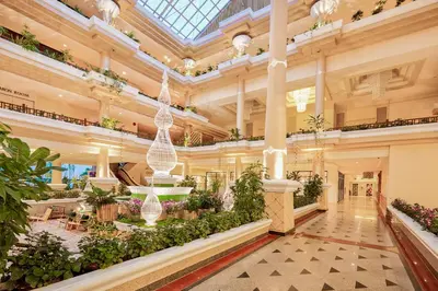 a large building with plants and a ceiling at Beyond Kata in Kata Beach