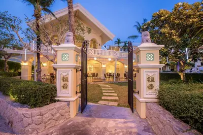 an entrance to a house with a gate at The Front Village - SHA Plus in Karon Beach