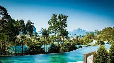 a view of the water from a resort swimming pool at Krabi Tipa Resort in Ao Nang Beach