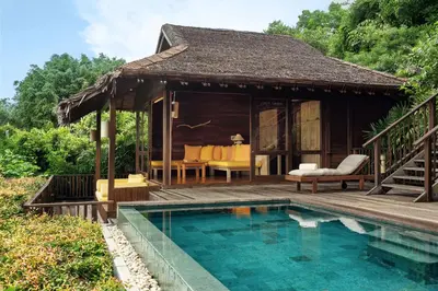 a resort with a swimming pool and a pavilion at Six Senses Yao Noi in Ko Yao Noi