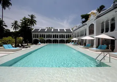a large swimming pool in front of a building at Racha Island Resort (Rayaburi) in Ko Racha Yai
