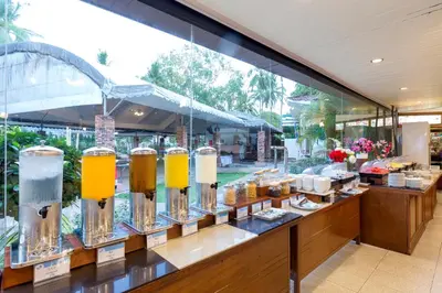 a display window of a restaurant with food items in jars at Krabi Resort in Ao Nang Beach