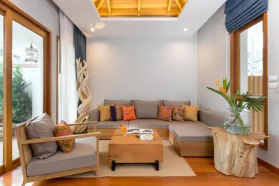 a living room with a couch and a coffee table at Krabi Resort in Ao Nang Beach