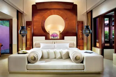 a bedroom with a large white bed in a room at Phulay Bay, a Ritz-Carlton Reserve in Tab Kaek Beach