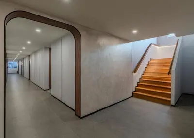 a hallway with stairs and a stair case at Panmanee Hotel-Newly Renovated in Phi Phi Don