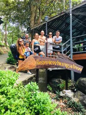 a group of people posing for a picture at a zoo at Sea View Bungalow in Phi Phi Don
