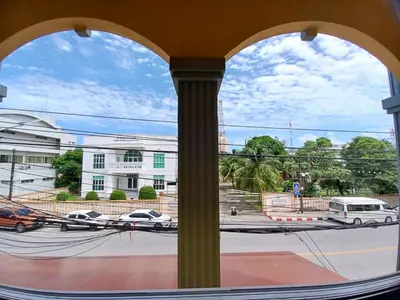 a view of a street from a window at In Phuket House in Phuket Town