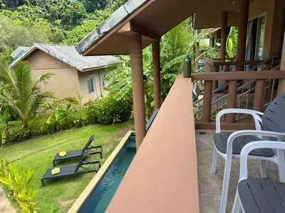a view of a house with a swimming pool at Sakoo Valley Naithon Beach in Nai Thon Beach