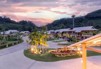 an aerial view of a resort at sunset at Sakoo Valley Naithon Beach in Nai Thon Beach