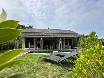 a house with a swimming pool and a patio at Sakoo Valley Naithon Beach in Nai Thon Beach